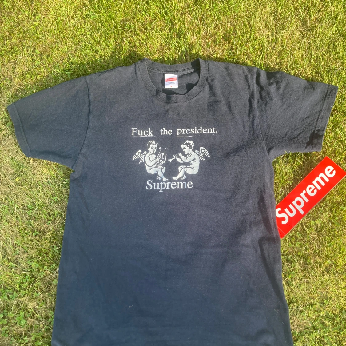 Supreme navy blue t-shirt med fuck the president print