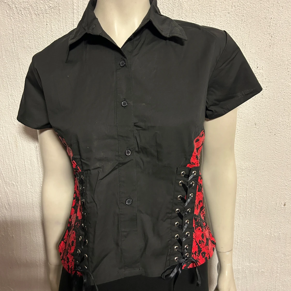 Lite kortare skjorta fr Poizen M/L