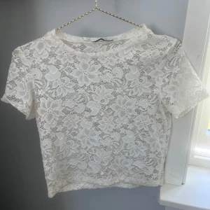 Blommig top - Från Zara str S/xs