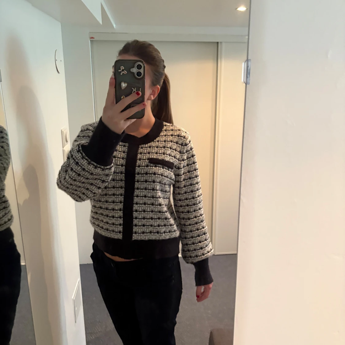 Svartvit rutig kofta