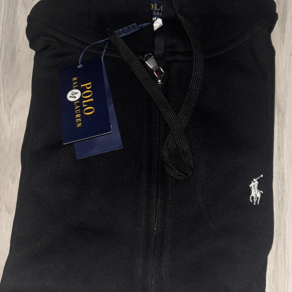 Svart pikétröja från Ralph Lauren