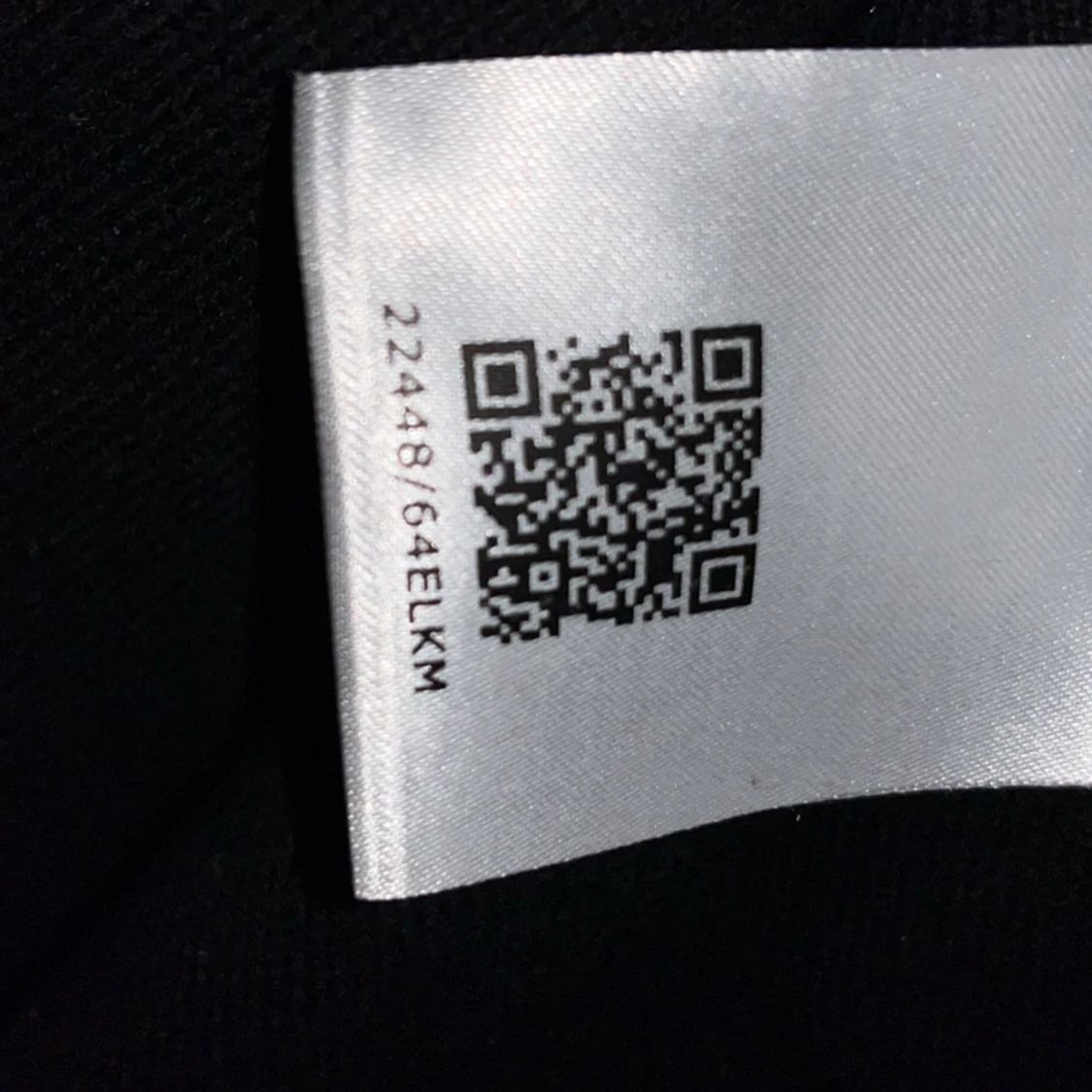 Svart pufferjacka med stickade partier - 2