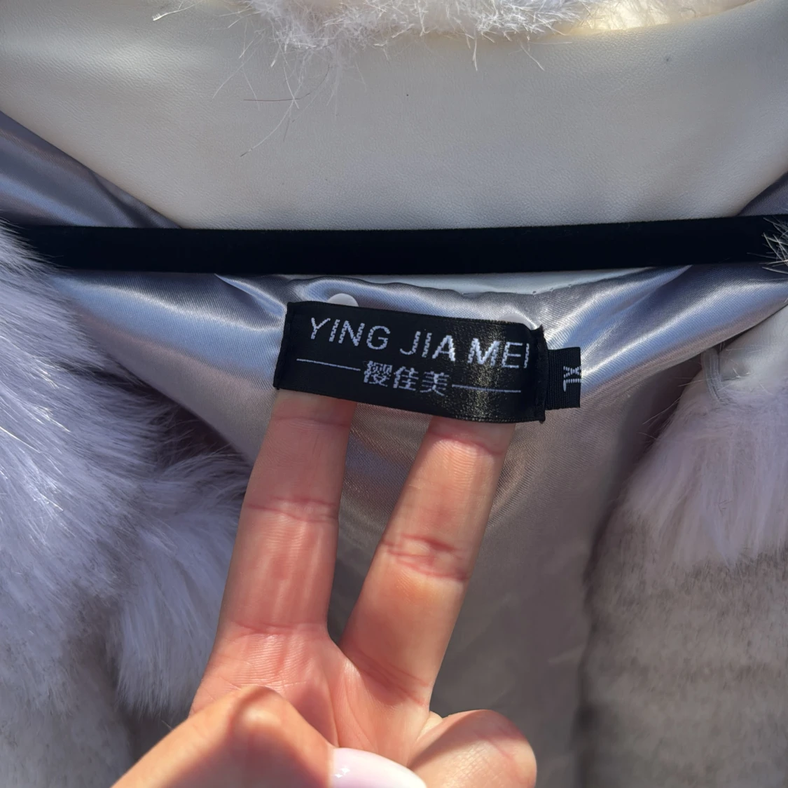 Vit pälsväst från Ying Jia Mei XL - 2