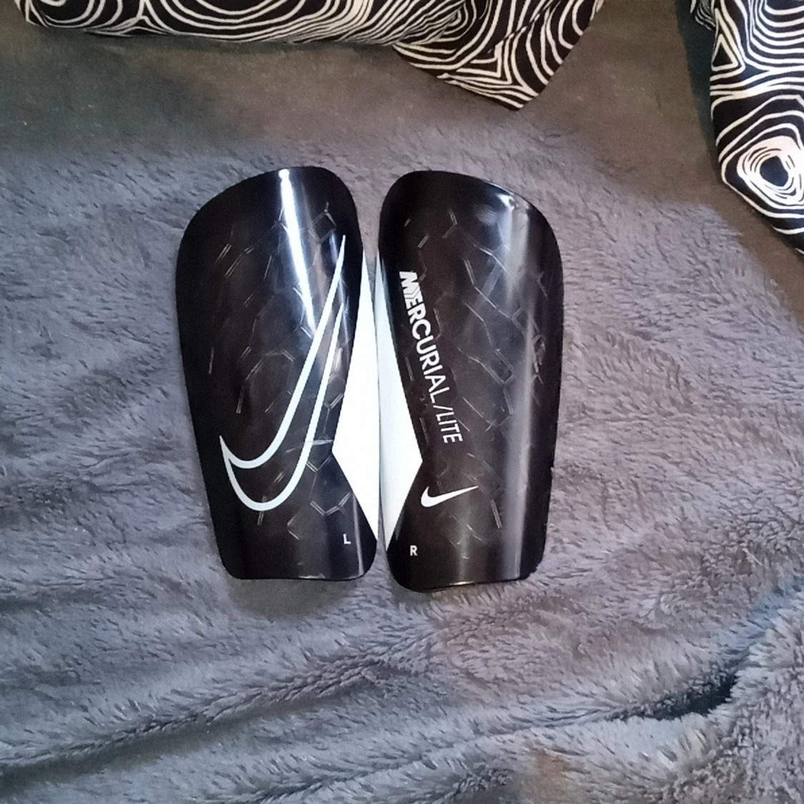 Nike Mercurial Lite benskydd