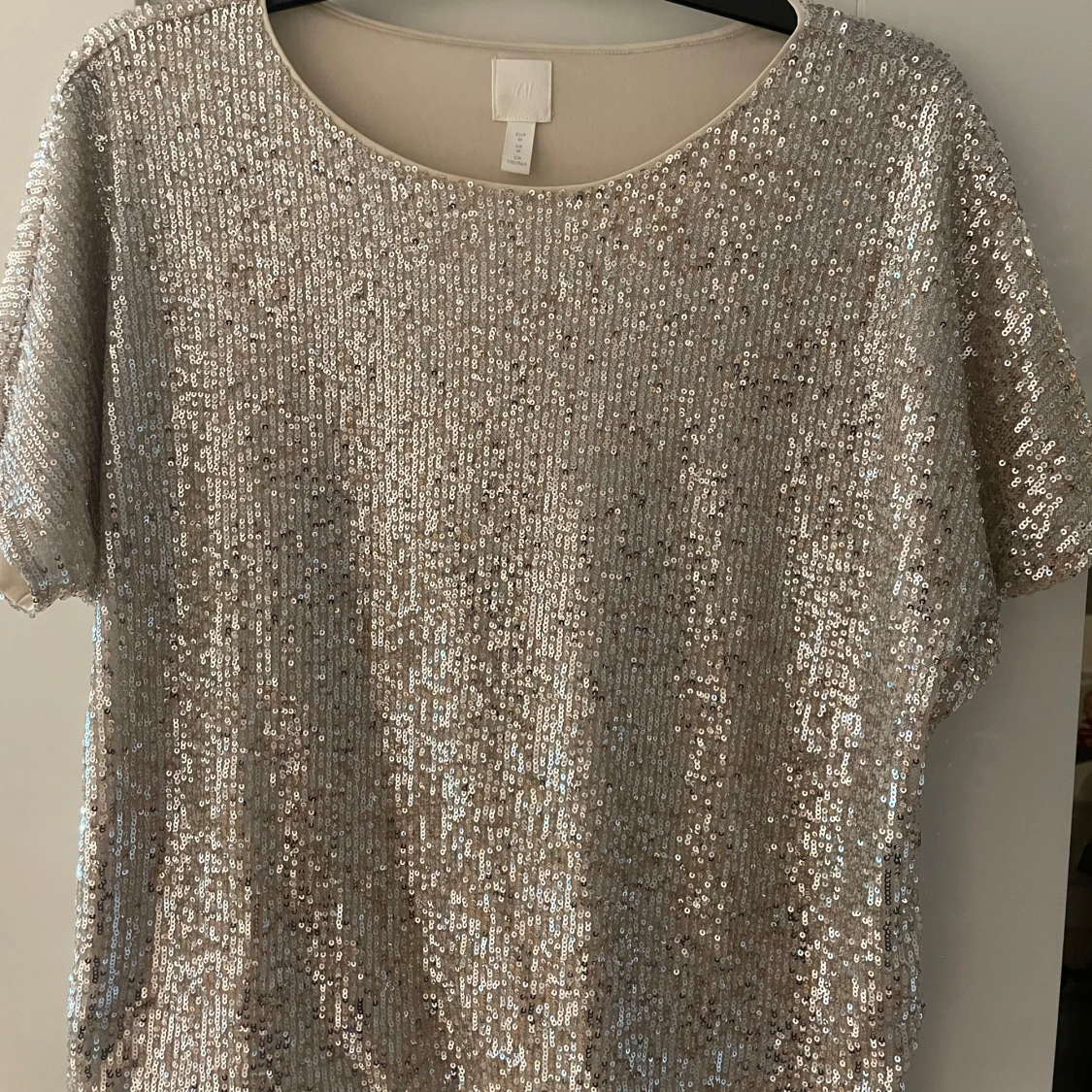 Glittrig silver/guld topp från H&M