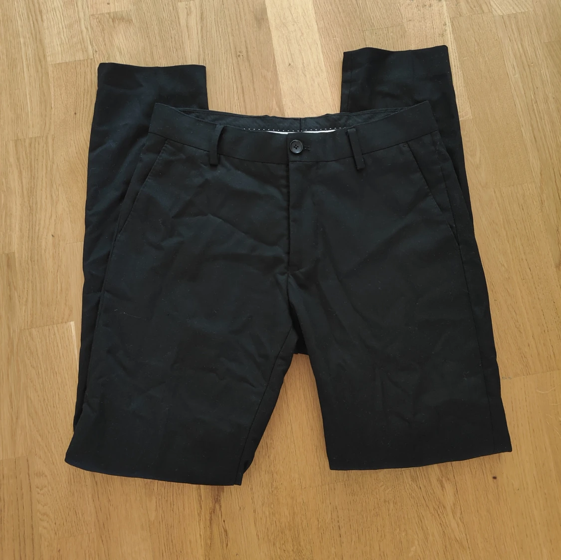 Svarta kostymbyxor från Riley Stanton