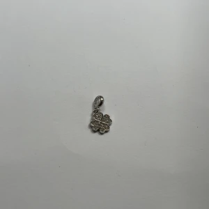Pandora charm - "Hey! ✨ Take a look at this gorgeous silver clover pendant! It's shaped like a lucky clover and covered in sparkling crystals. This pendant is a perfect way to add some sparkle and good luck to your day. 