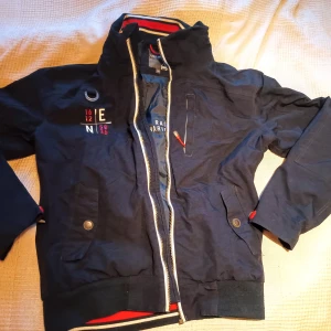 Race Marine vindjacka - Race marine jacka,använd en gång.
