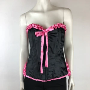 Korsett ( Ej underklädeskorsett) XL - Vacker korsett ( Ej underklädeskorsett) Storlek XL. Snörning i ryggen. Helt ny.