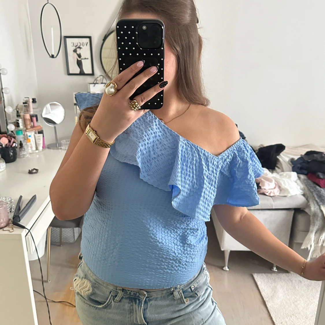 Blå topp med volang från Lindex