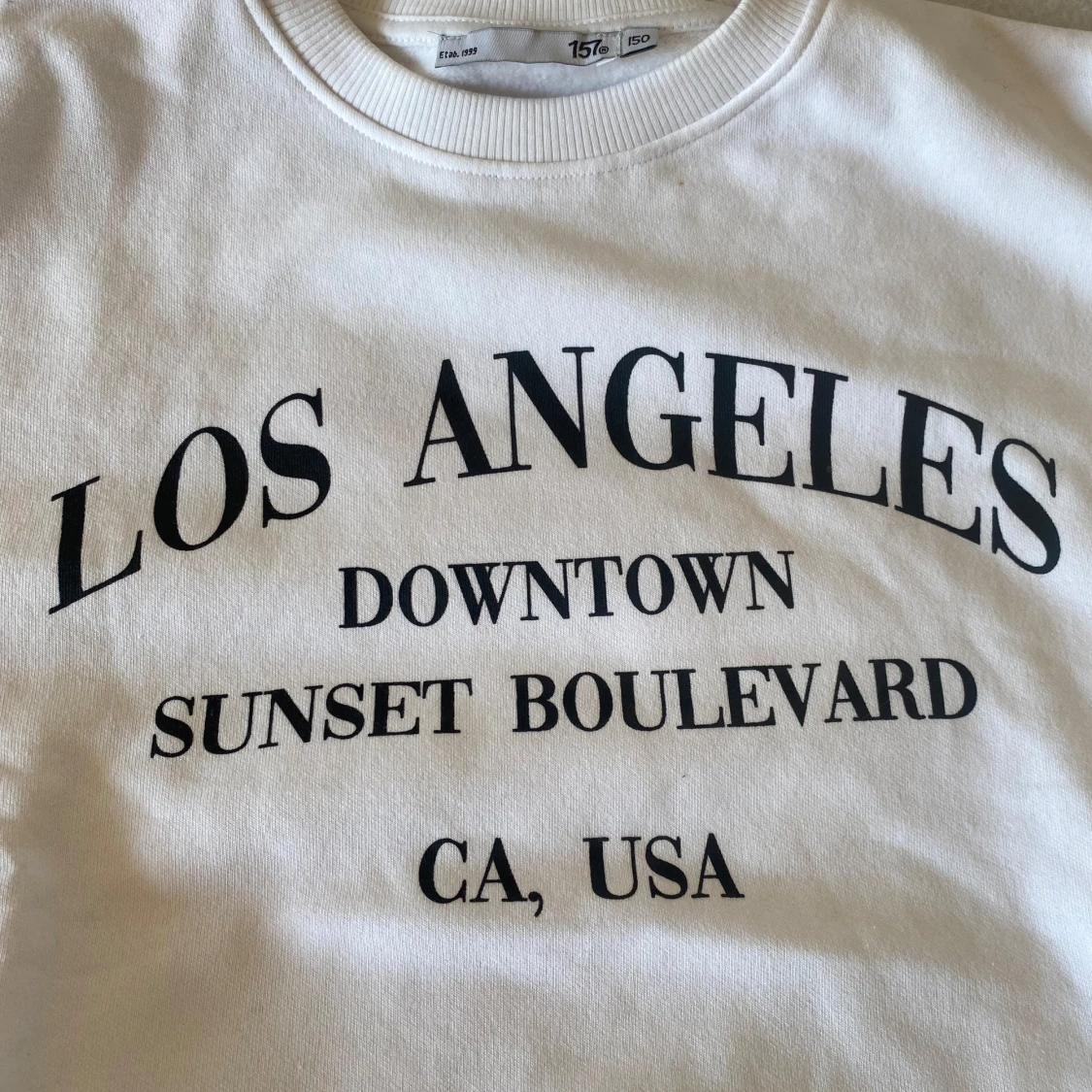 Vit sweatshirt med Los Angeles-tryck - 1