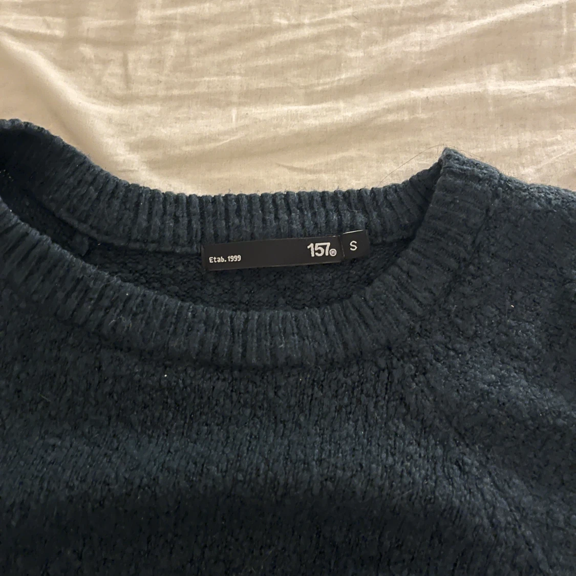 Mörkblå stickad tröja från 157 - 3