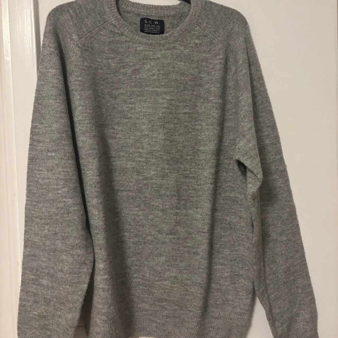 Grå stickad tröja från S.C.W.