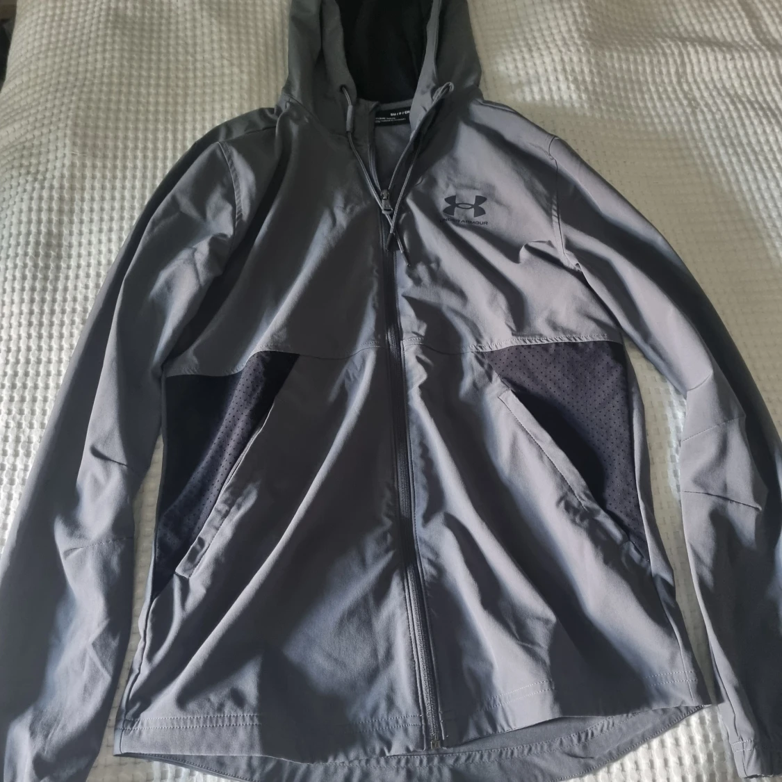 Grå jacka från Under Armour