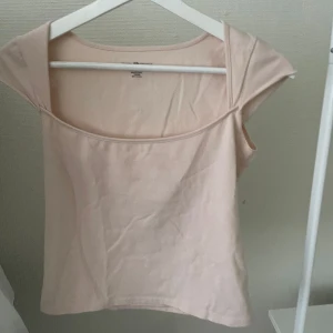 Ljusrosa topp från Brandy Melville - Helt ny från Brandy Melville. Aldrig använd. Nypris ca 190. Så mjuk!