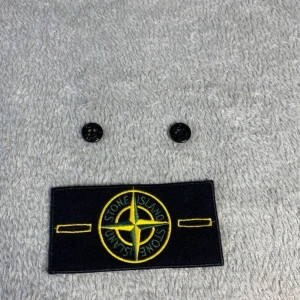 Stone Island Märke Badge - Ingen täcken på användning så gott som ny