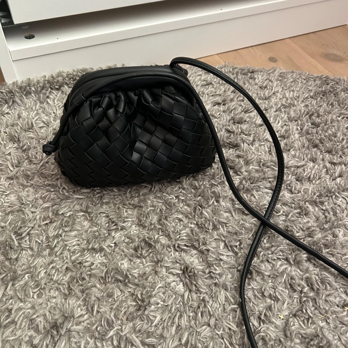 Flätad clutch väska