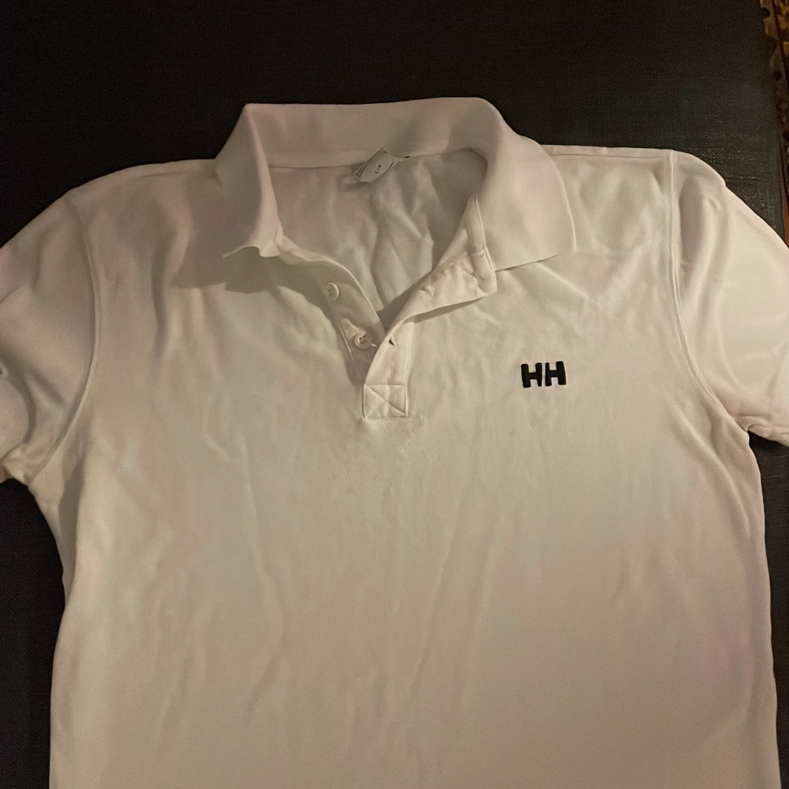 Vit pikétröja från Helly Hansen