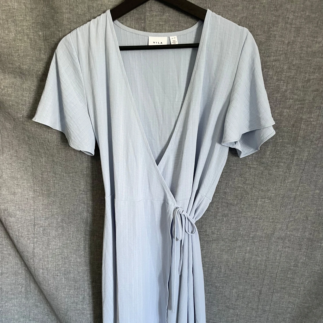 Ljusblå omlottklänning från Vila