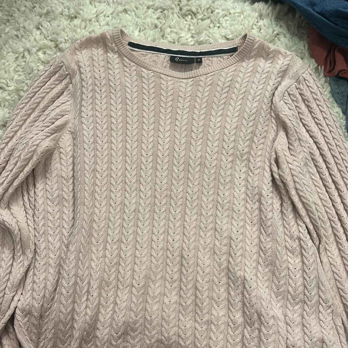 Ljusrosa stickad tröja