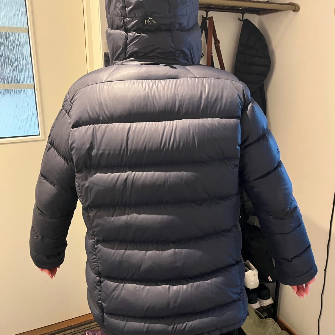 Mörkblå Peak Performance dunjacka - 1