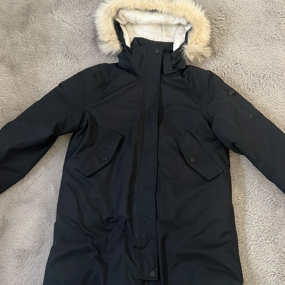 Svart parkajacka från McKinley, 158 (XS)