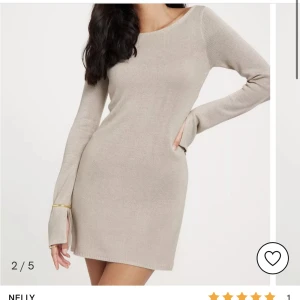 Stickad klänning - Stickad klänning från Nelly, använd 1 gång 