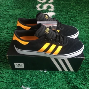 Adidas adi-ease premiere black/yellow - Size US 10,5 = EU 44 2/3. Brand new with tags. All original + receipt. Please send a message before buying.