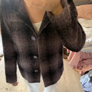 Vårkappa  - En fin vårkappa som är använd fåtal gånger. 