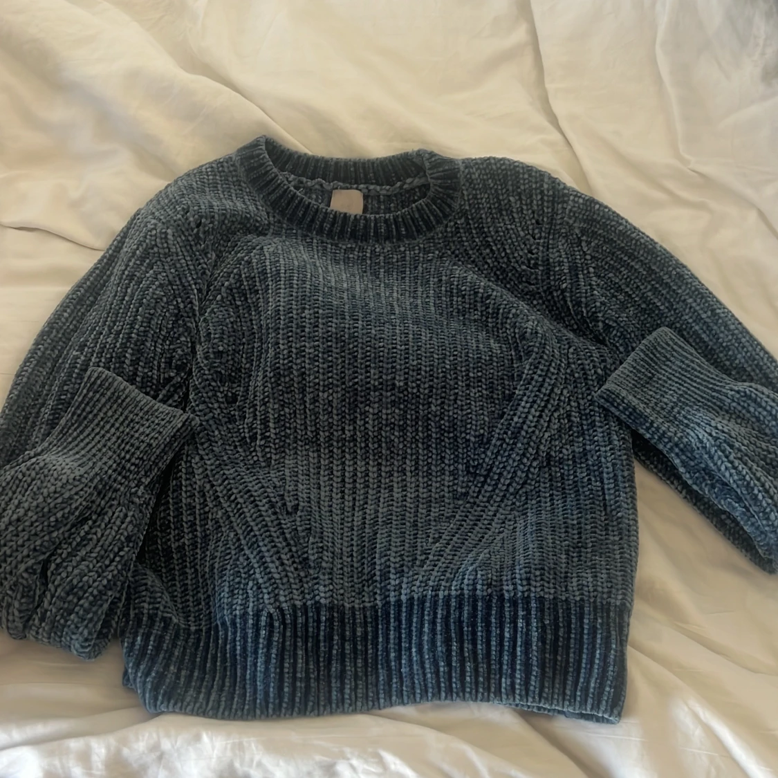 Blå stickad tröja