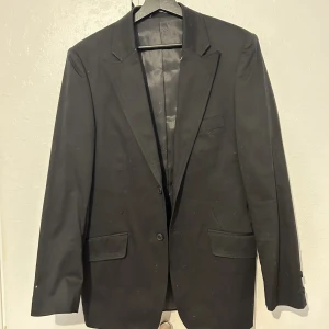 Kavaj  - Inte använt, köptes begagnad. Typ L i storlek? 