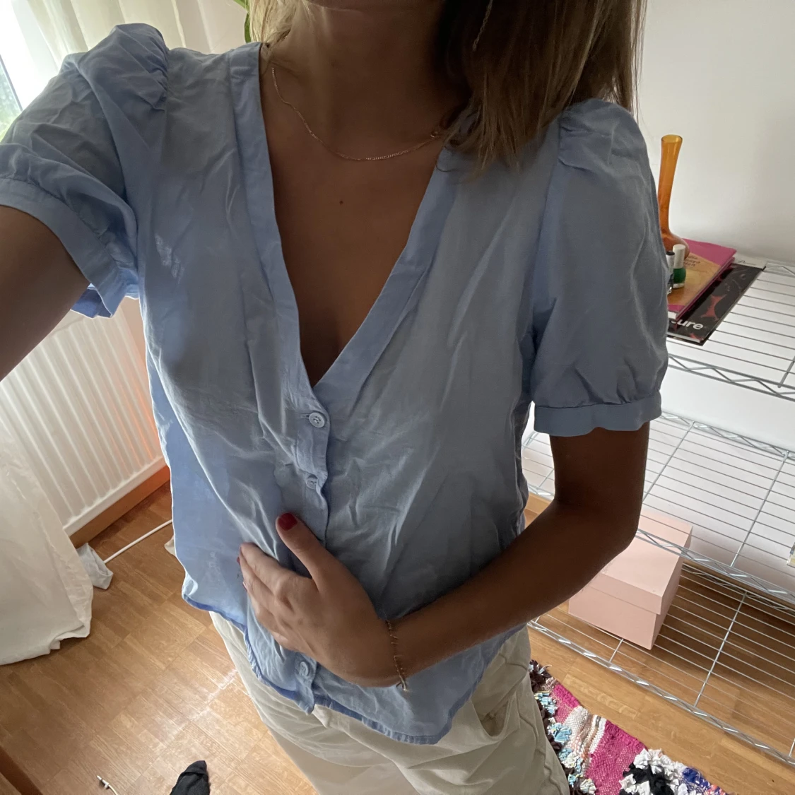 Blå blus med knäppning - 91