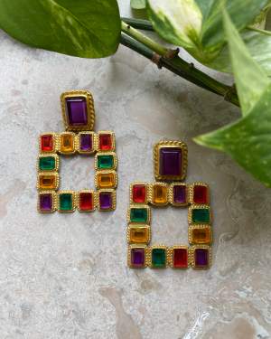 Here's a beautiful 90s vintage set of cocktail earrings. Rope Knot Trimmed Metal earrings. Golden color with multicolor crystal beading. Meant for pierced ears. Make a statement with a sleek bun & blazer combo. Excellent Condition.  5x7cm  #jewelry