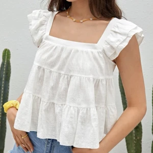 Volangblus - Superfin Vit volangblus, strl s, aldrig använd så i nyskick<33