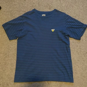 Kaws x Uniqlo - Cool Uniqlo x Kaws tee
