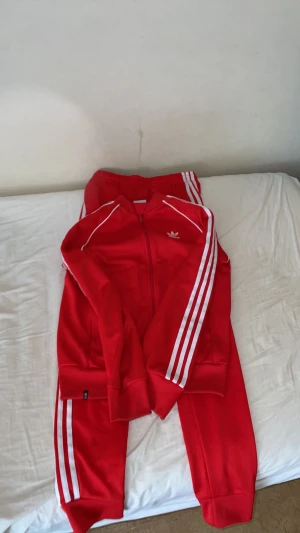 Adidas Tracksuit - I didn’t use for that much they are almost new They are both S