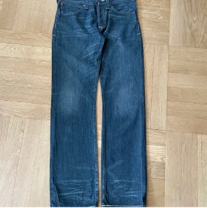Evisu X Puma jeans - Evisu jeans som säljes pga för små. Köpta här på Plick Bra skick inga tecken på större användning.