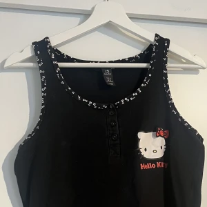 Hello kitty linne. - Hello kitty linne i storlek M.💕