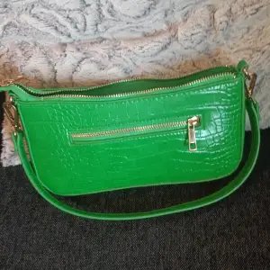 Grön handväska i nyskick. 