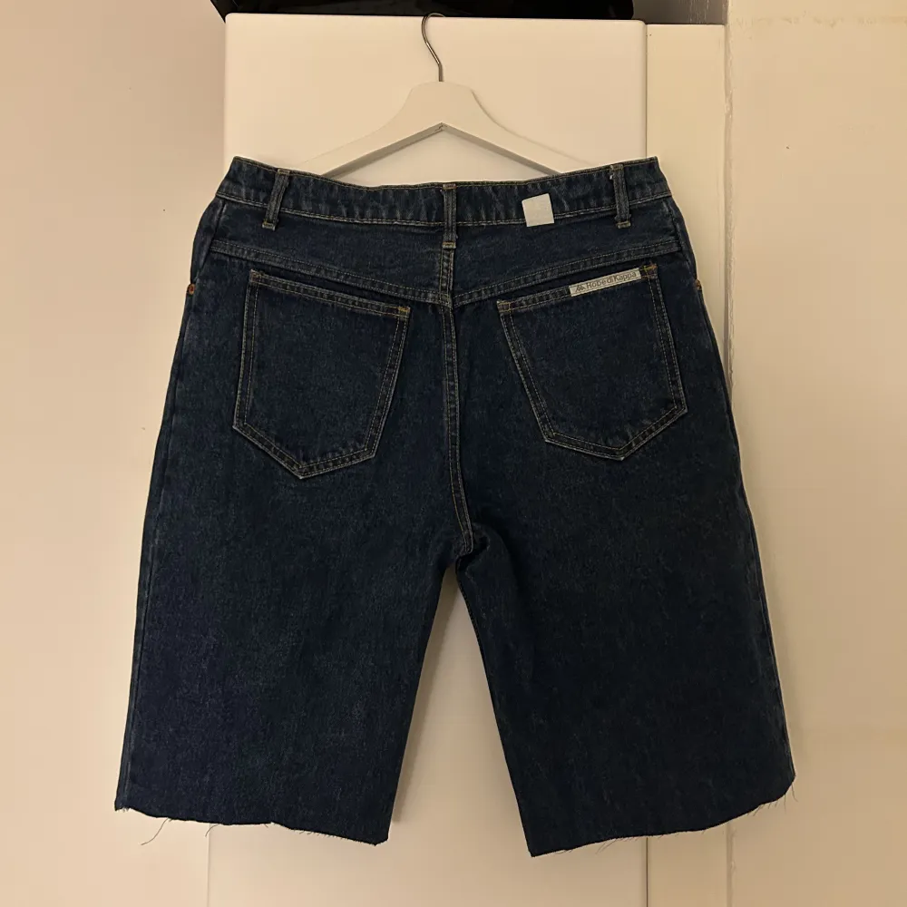 Jeansshorts från Kappa W32  Bra skick. Shorts.