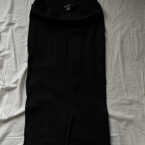 Kjol med slits - Kjol med slits Storlek 34 Ribbad Knä lång