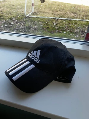 Adidas keps  - Helt oanvänd adidas keps. 