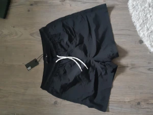Badshorts - Säljer istället för att returnera. Så mpste säljas ganska snart. De var för små för mig. De är från lager 157.