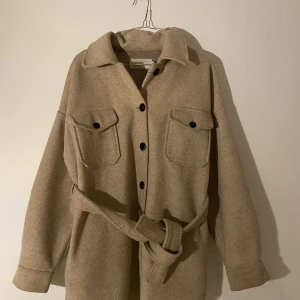 Kappa - Nelly kappa med knyte 