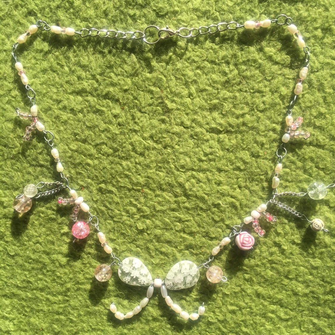 Rosa/vitt halsband med rossetter - 90