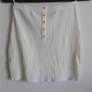 white boho mini skirt from shein. about 3 years old only worn once, looks pretty new but a little see through