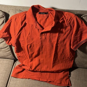 Piké Matenique - Rostbrun/orange pike från märket matenique i väldigt bra skick Storlek M