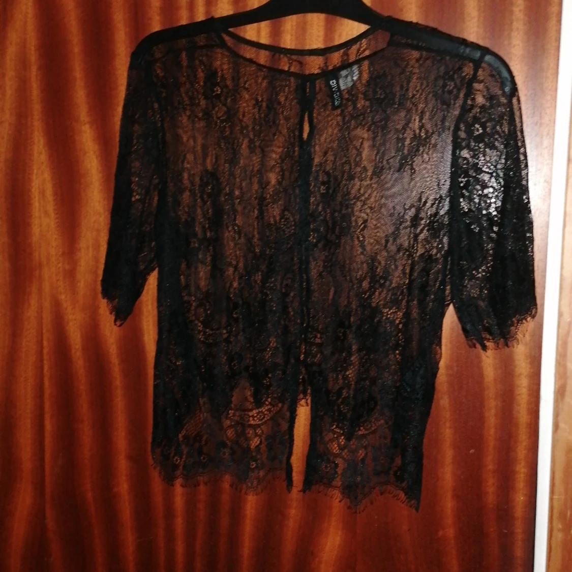 Svart mesh magtröja från H&M