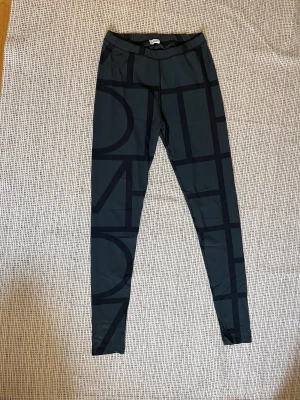 Toteme  - Toteme classic grey logo leggings. Great condition  Size L