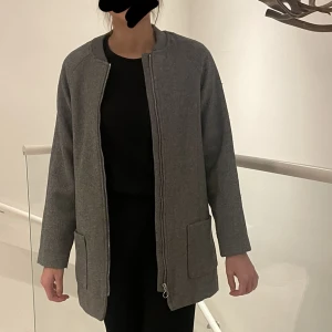 Grå kappa - Grå kappa i fint skick